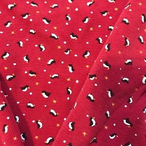 Super cute penguin sweatshirt.